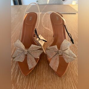 Bow Trim Vinyl Heels - Zara
Never worn- new with tags
Sling back - Size: 7.5